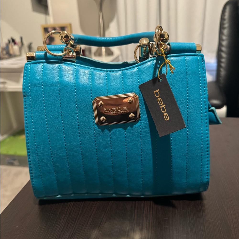 Bebe Blue Quilted Handbag